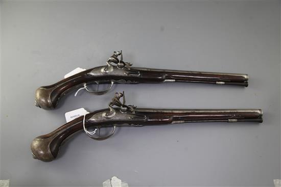 A pair of 20 bore Flemish flintlock holster pistols by C. Chaplot A. Adelshein, late 17th century, 12.75in. barrels, overall 20in.